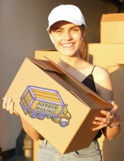 Happy customer with Harbor Moving LLC box